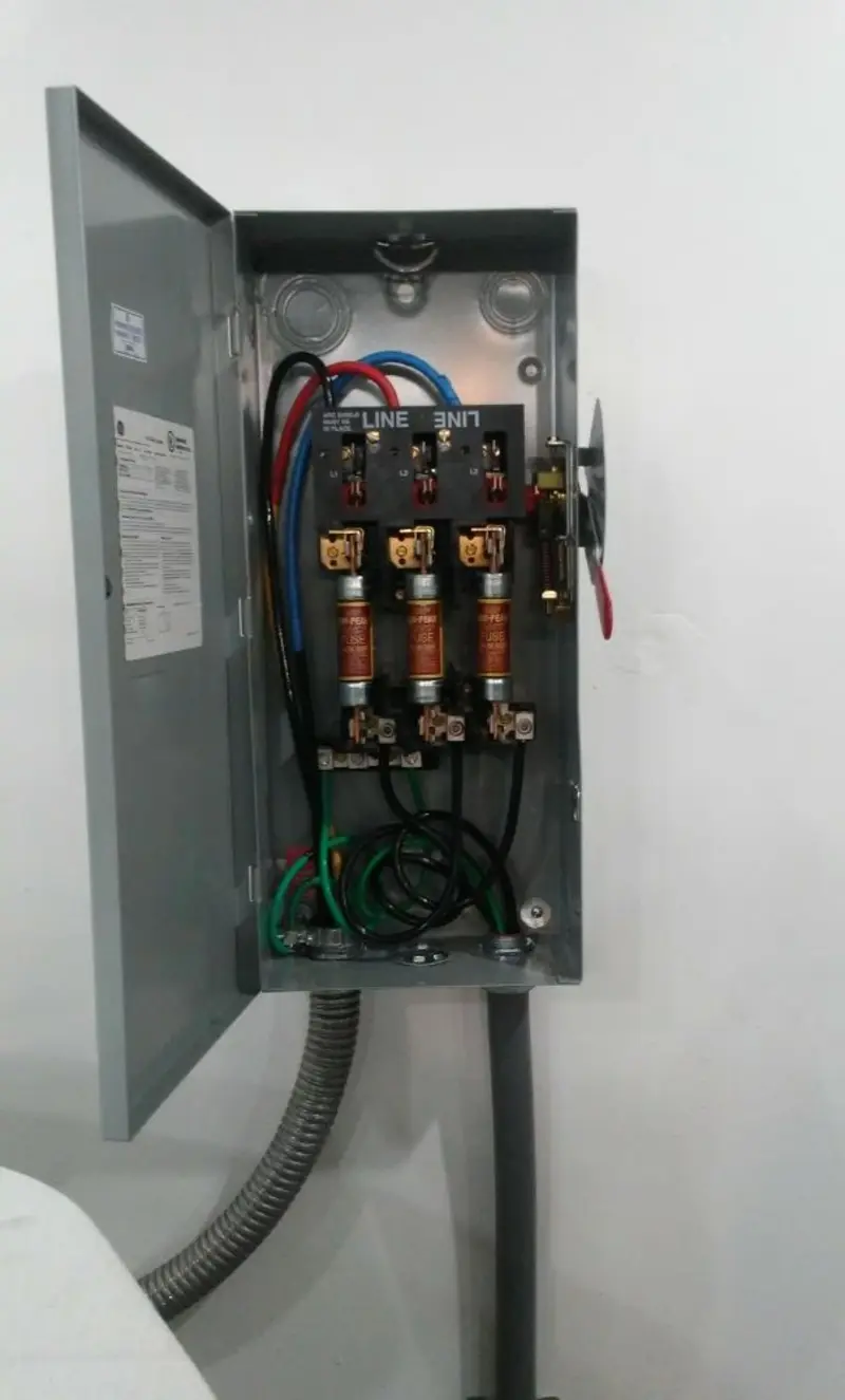 Three-phase disconnect switch installed for Smoke Detector Installation in Aldine