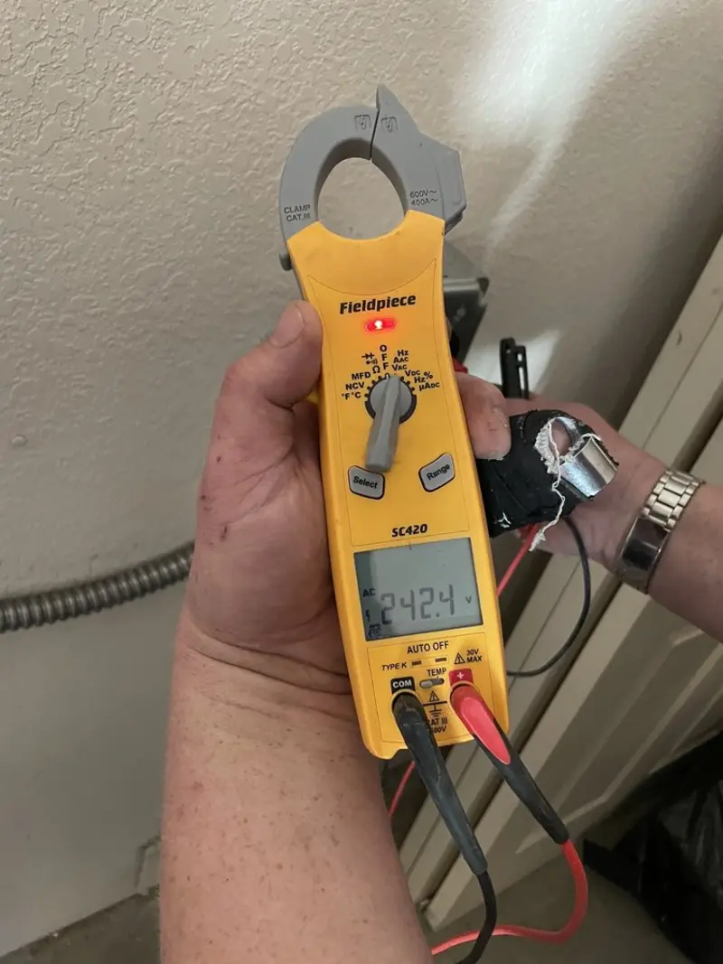 Voltage testing with clamp meter during Aluminum Wiring Replacement in Aldine